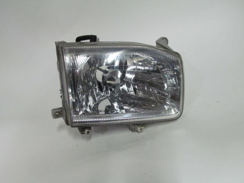 99 00 01 02 03 04 nissan pathfinder oem right headlight nice!