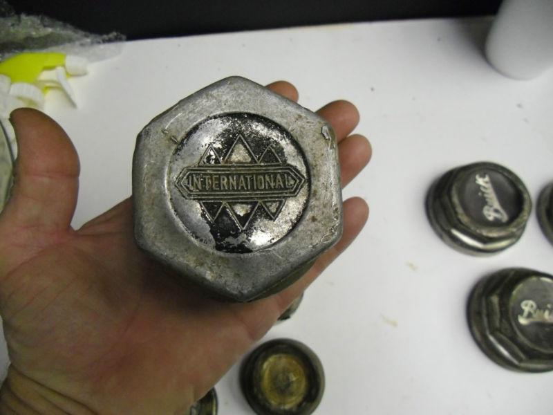 Purchase 6 OLD CENTER HUBCAPS FORD CHEVY INTERNATIONAL in Healdton