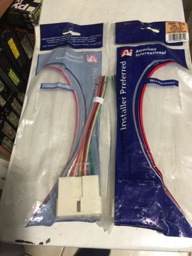 Wiring harness adapter plug for aftermarket radio iwh974 american international