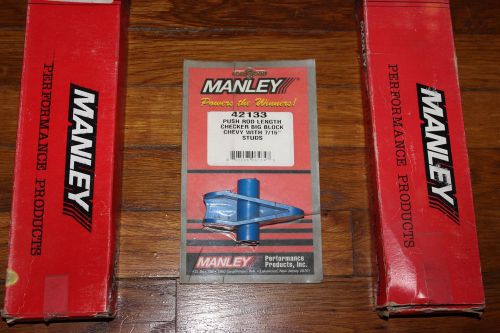 Big block chevy manley pushrods and checker.