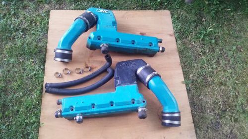 Omc 185 chevy exhaust manifolds 909280 909279 risers 909218 909683 and pipes