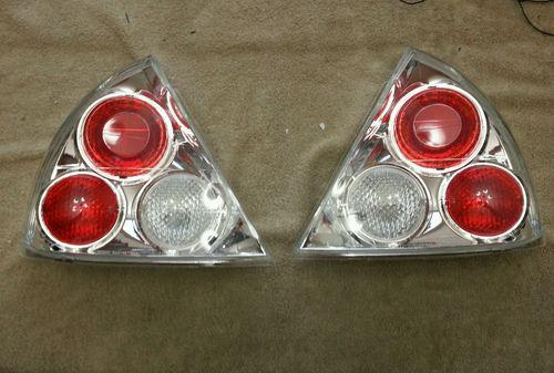 1999-2002 mitsubishi mirage chrome altezza euro tail lights passenger & driver