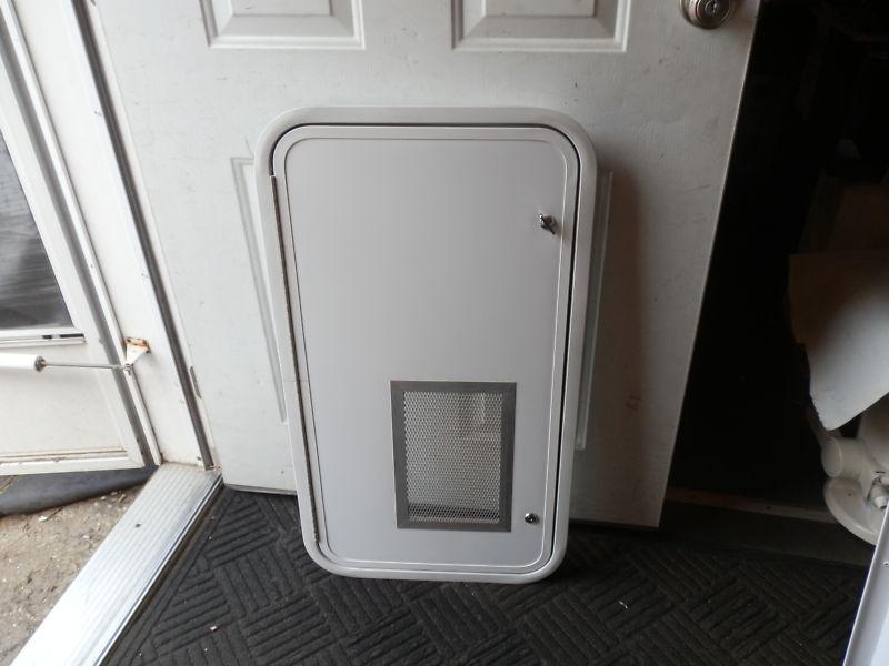 Rv cargo door  r.o. 34" tall x 18" wide x 2" thick vent on bottom