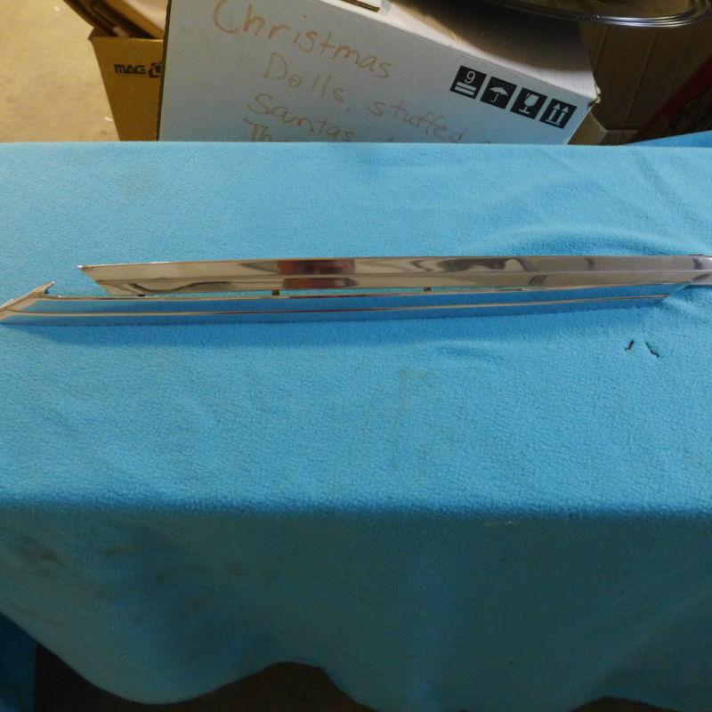 1964 (possibly 63 also) pontiac grand prix rear quarter belt reveal - both sides