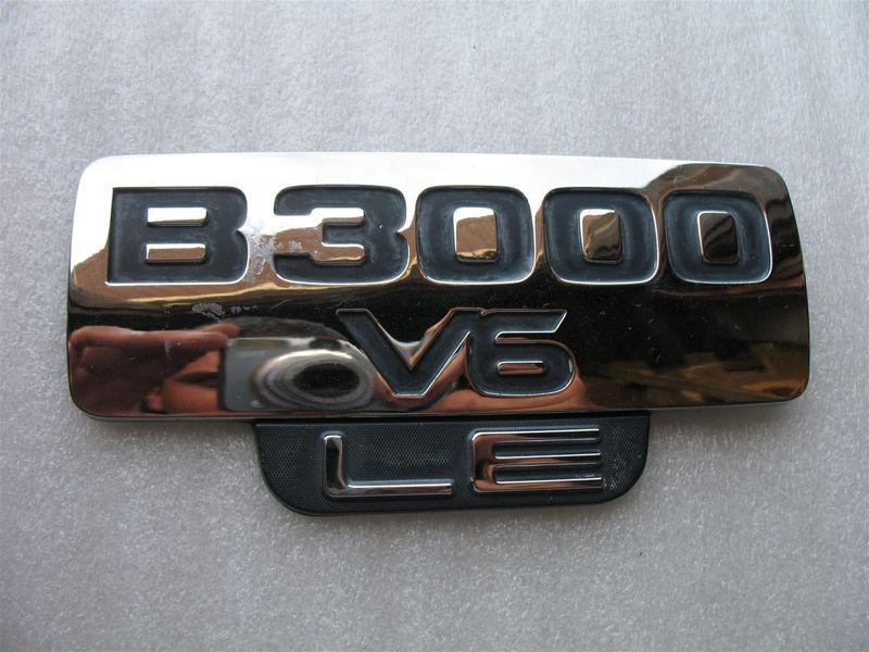 2001 mazda b3000 v6 le side fender chrome emblem logo 98 99 00 01 02