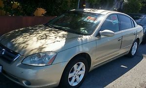 2002 nissan altima 2.5 s, 4 cyl, 4 doors.