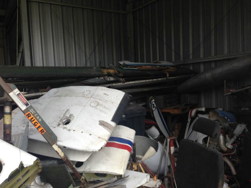 Hangar 2 full of parts, flight controls, cowls, parts cessna beech, piper, tanks