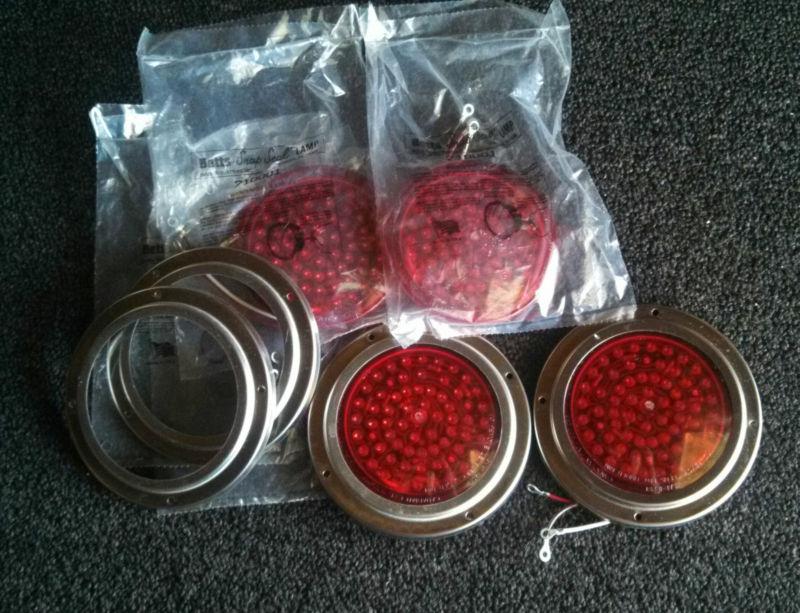 Set of 4 , betts led lens inserts red 710001 & 4 stainless rings great deal !!  