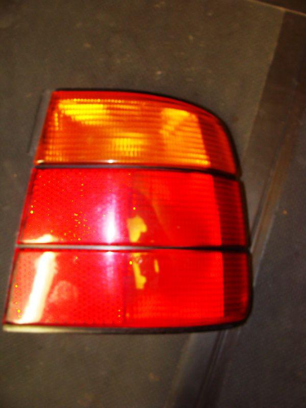 1989 - 1995 bmw 5-series right side oem red/amber tail light 