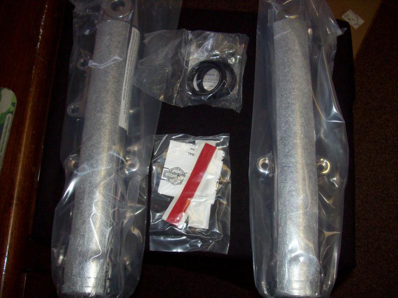 Genuine harley kit, chrome fork sliders, fxst. part number:  46477-07