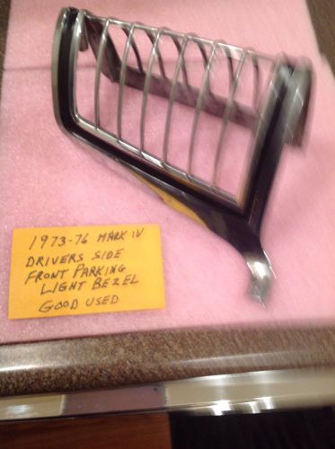 One good parking light bezel drivers side for 1973-76 mark four