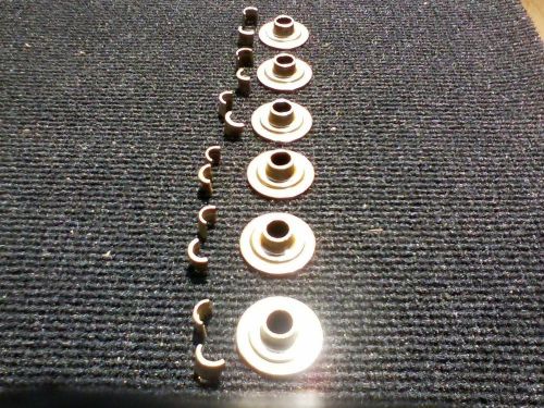 Chevy valve spring caps 1935 to '47. a set of 6 inlet with set of 12 "u" keys.