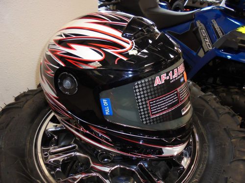 Brand new xxl polaris af 1.5 helmet in red, white, and black.