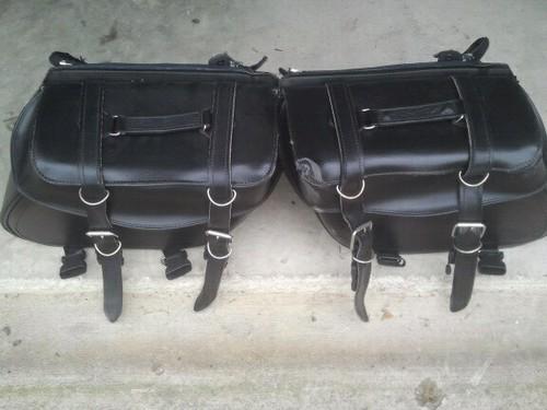 Hard leather saddle bags