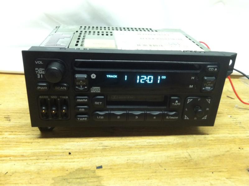 97-02 jeep wrangler tj cherokee dodge chrysler oem cd/cassette radio p04704383af
