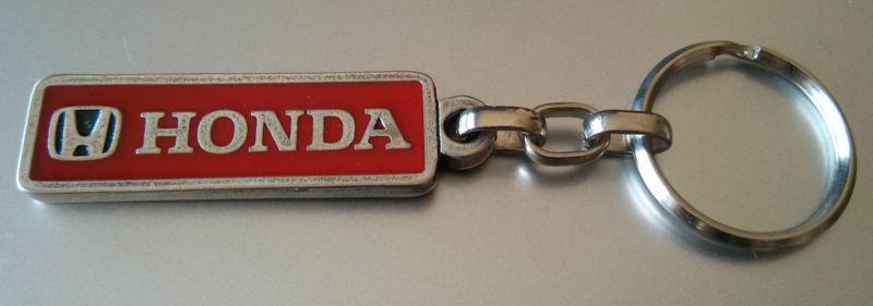 Keychain with honda sign on it, honda keychain