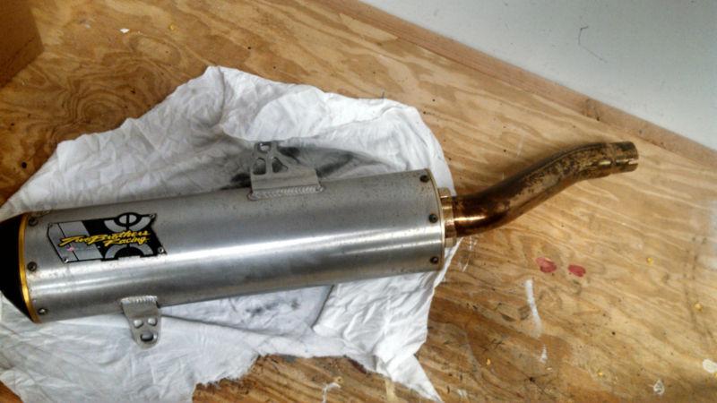 Two brothers slip on exhaust for 2008 suzuki king quad 750axi