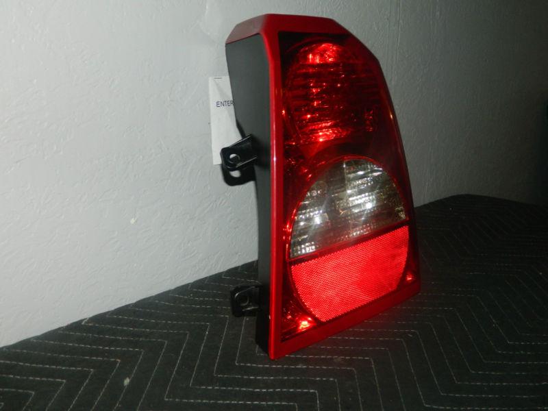 Oem 2007 dodge caliber  right/ passenger rear tail light assembly