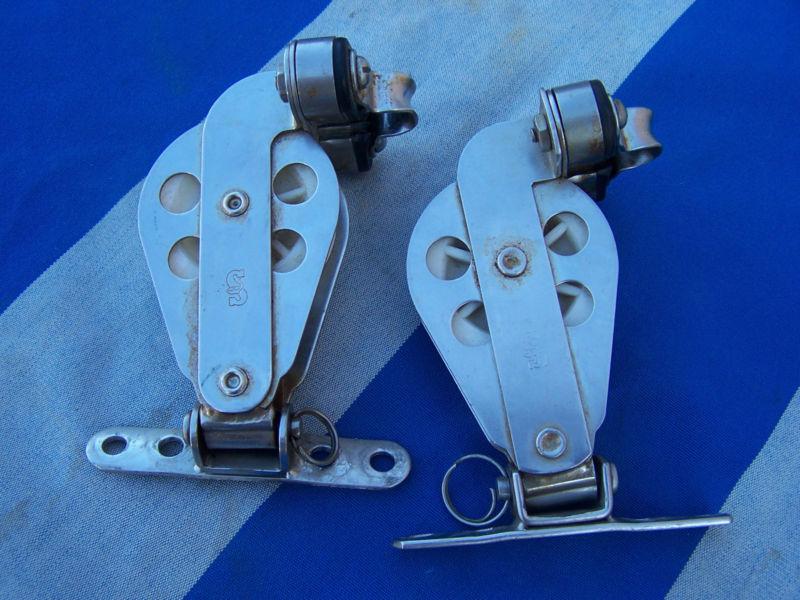 Two sailboat blocks with cam cleats