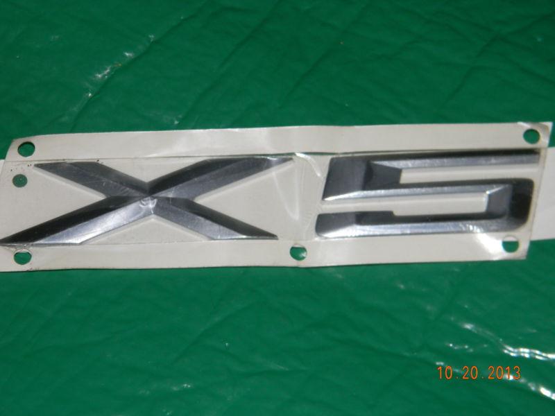  bmw x-5 emblem,  13.99 shipping 3.50  to lower 48