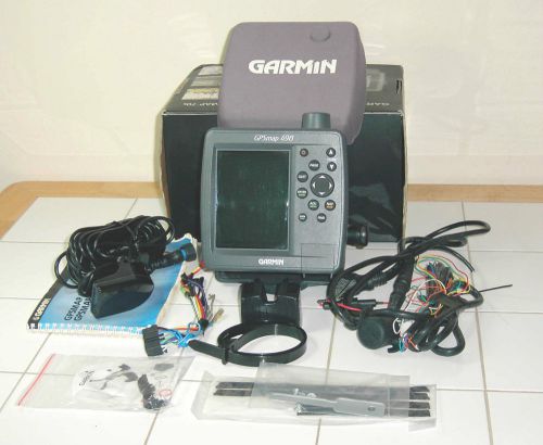 Garmin gpsmap 498 chartplotter w/ transducer, data card, wiring harness, manual