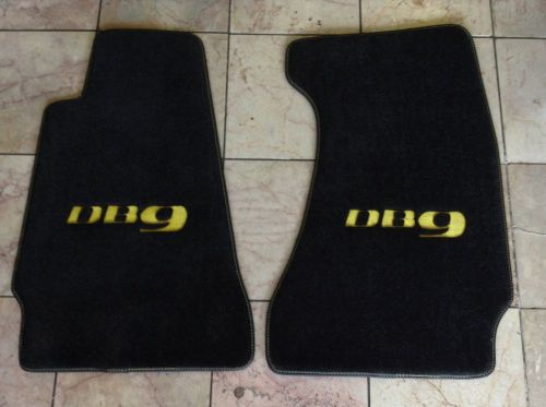 Aston martin db9 black floor mats db9 logo yellow stitching carbon fiber border