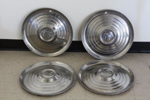 Original first edition mercury spartan  hubcaps