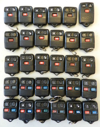 Lot of 30 keyless entry remotes ford