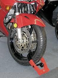 The club® tire claw for motorcycles and scooters wheels up to 6.3 inches wide