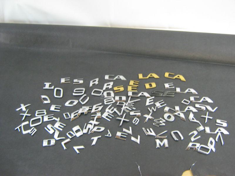 Huge lot of miscellaneous car and truck emblem unknown makes and models