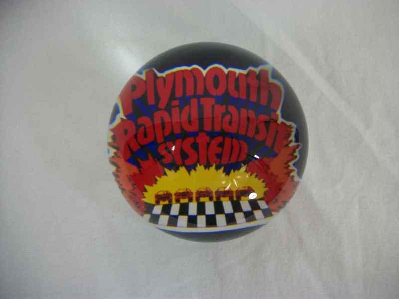 Plymouth rapid transit glass paperweight
