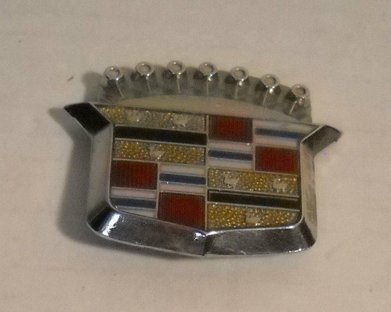 1970s era cadillac trunk lock cover emblem crest 200056