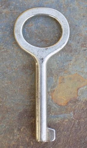Antique nickel plated ford deck key