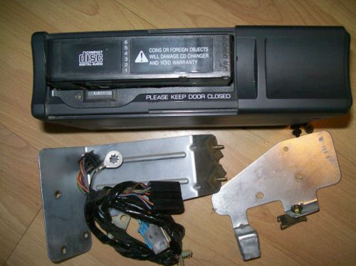 1996 - 2007 ford taurus cd changer  fits mecury sable  4-door  add cd