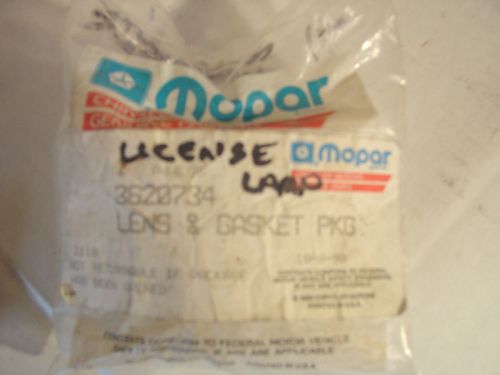 Mopar 1966-74 nos b body license lamp lens &amp; gasket iop