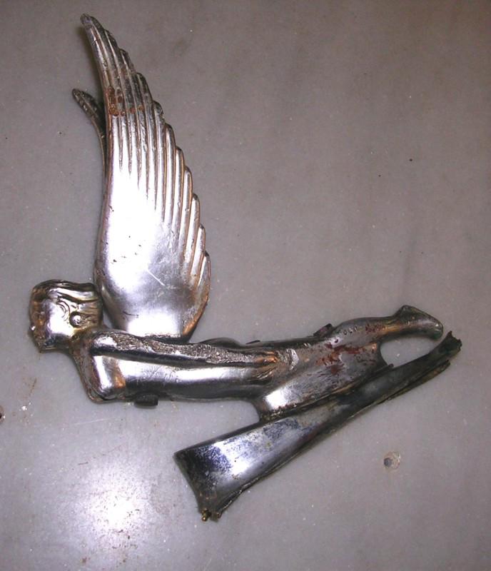 Vintage car eblem - girl with wings  
