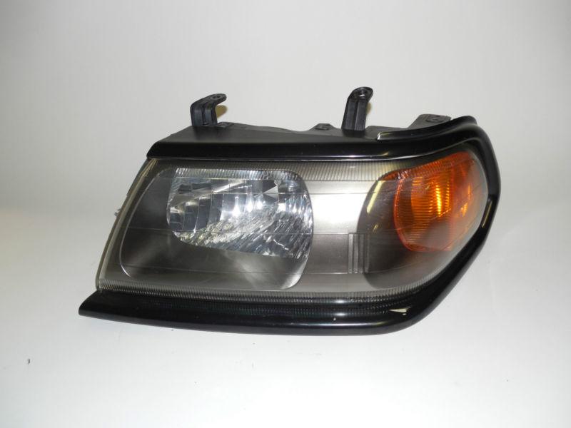 00 01 02 03 04 mitsubishi montero sport oem left headlight nice! 