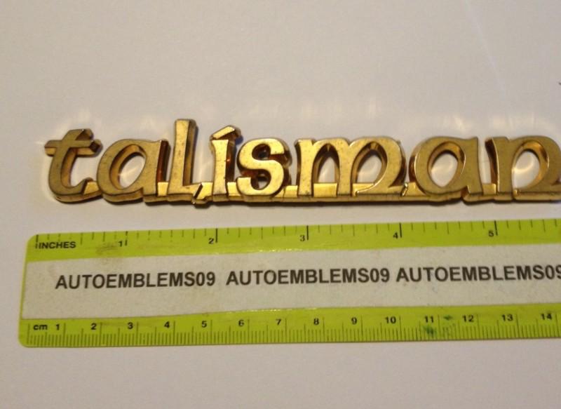 Cadillac gold talisman emblem used
