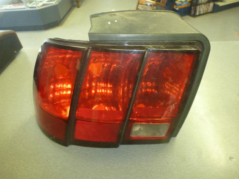 Buy OEM FORD MUSTANG TAIL LIGHT LEFT DRIVER SIDE 9904 in Harrison