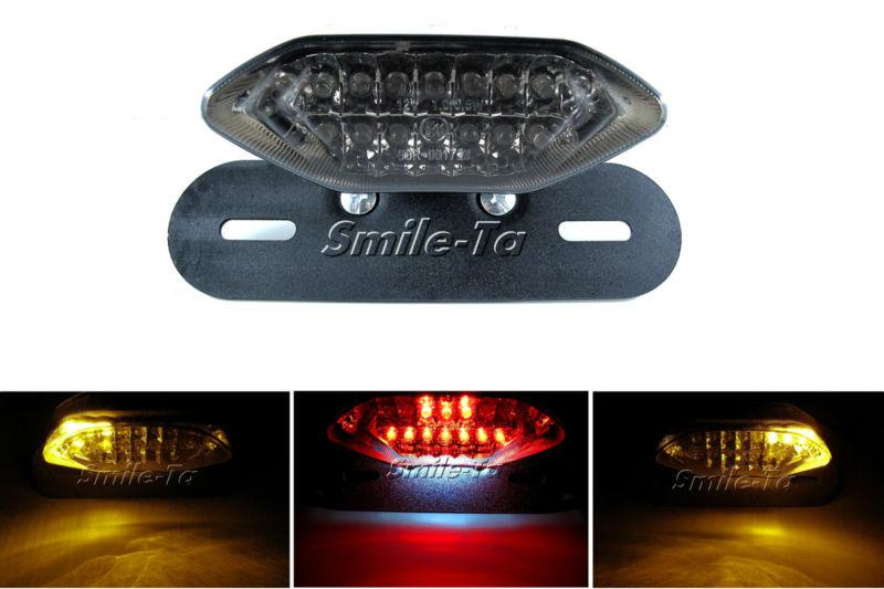 Motorcycle led atv tail light/turn signal/brake/running license plate holder ^