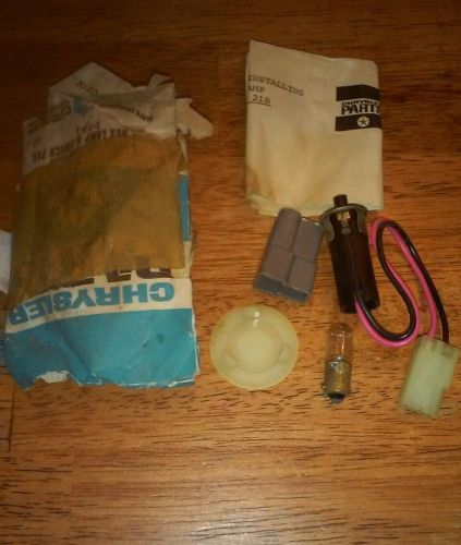 Nos mopar #2947218 glove box lamp package 1969-70 # on switch 2864405