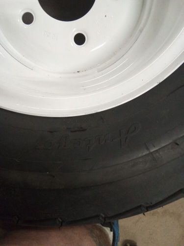 Autego trailer tire and wheel assembly white 20.5x8.0-10 pr