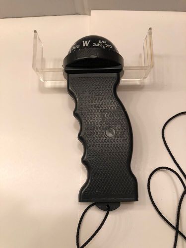Hand held pistol grip bearing compass