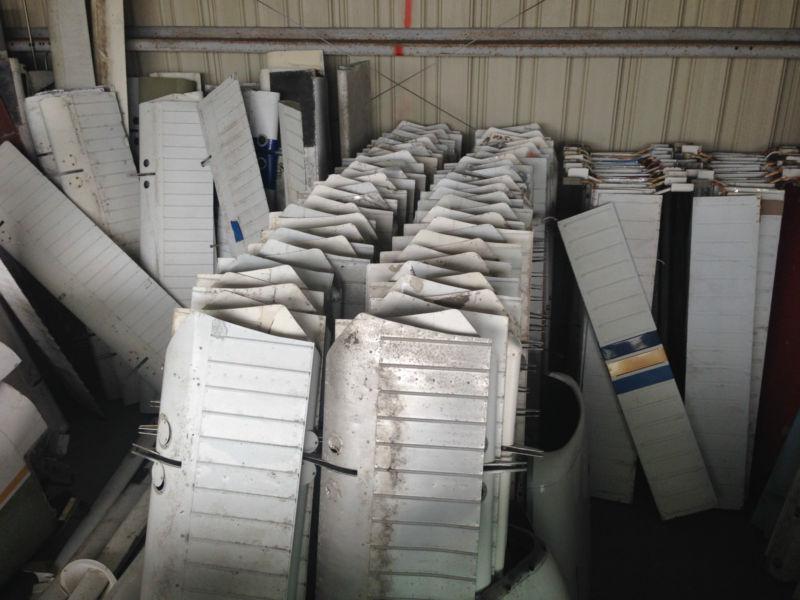 Hangar full of parts, flight controls, cowls, cessna beech, mooney, piper, tanks