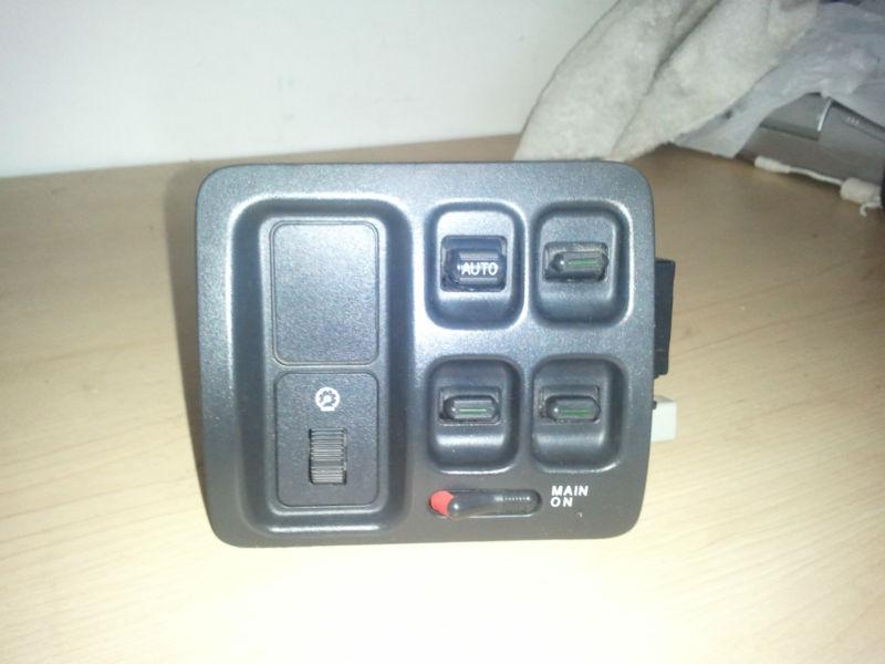 Find 1996 2001 HONDA CRV MASTER WINDOW SWITCH, OEM BLACK in Orange