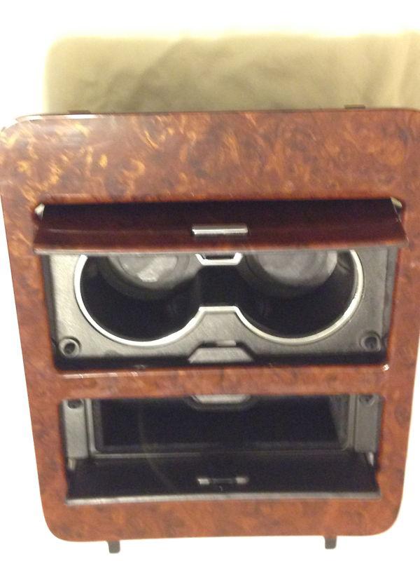 20951473 woodgrain center console cup holder/storage full size gm trucks & suv's