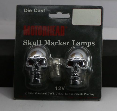 Skull marker lights, universal fit, nos original stock 12v , red eyes