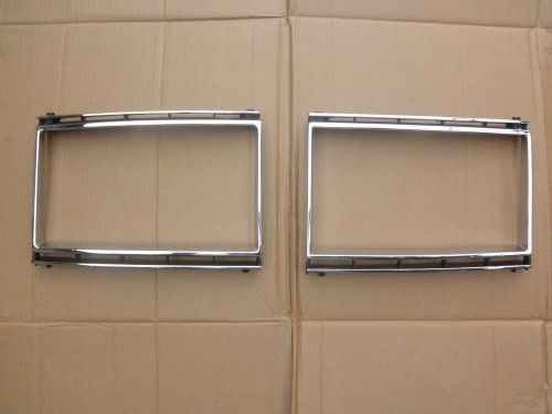 Nos volvo 240 series e-code headlight rims