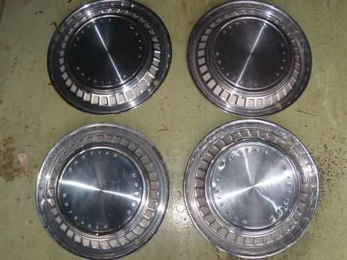 1960 pontiac hubcaps - x 4 - see photo, nice condition for a driver