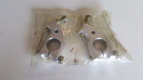 Aluminum torsion arm stops